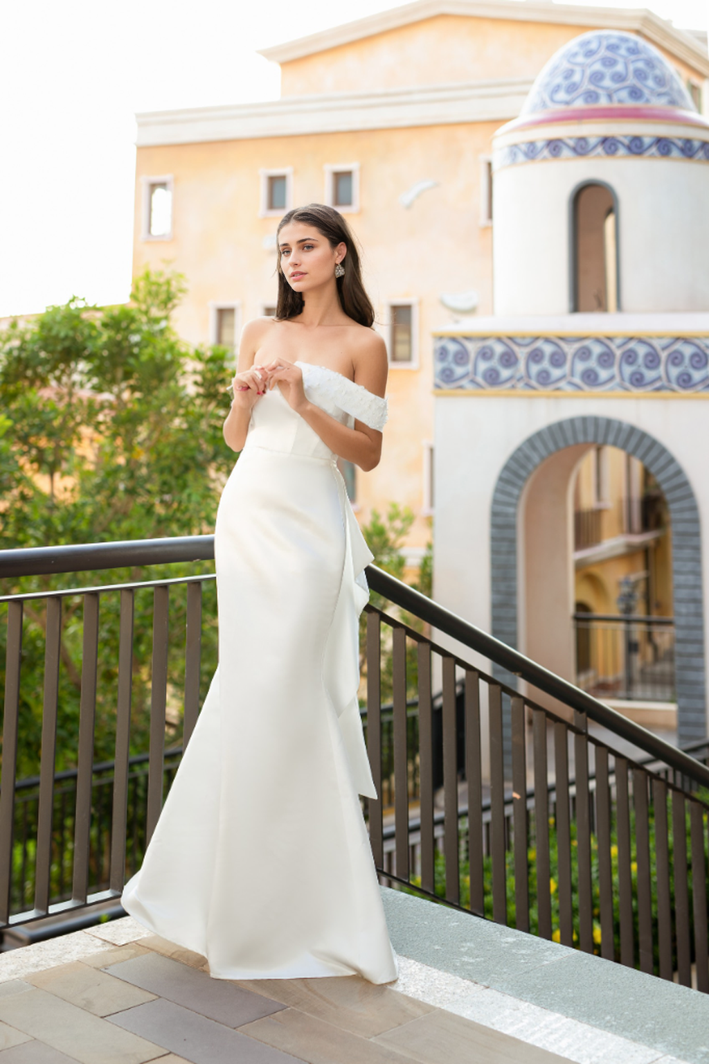 Mermaid gown with strapless bodice and 3D floral accents