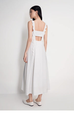 Back view showing scallop-trim and open back with elastic