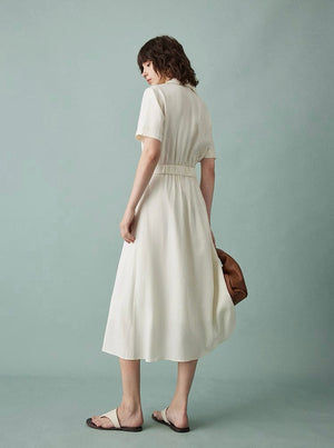 Close-up of chest pockets and collar on shirt dress