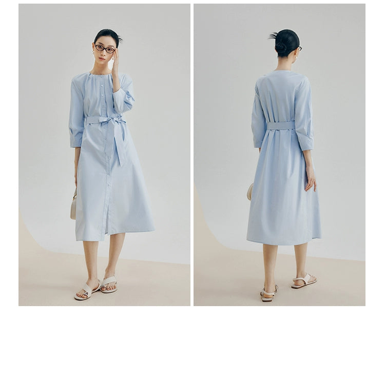 Back view showing gathered waistband and A-line skirt