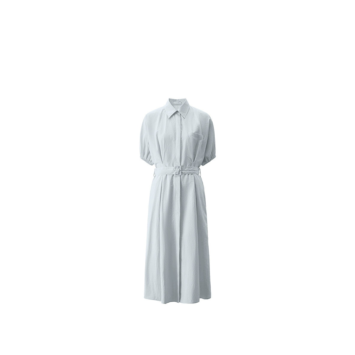 Modern resort-style outfit with subtle structure