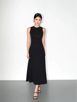 Minimalist black dress with sculpting waistline