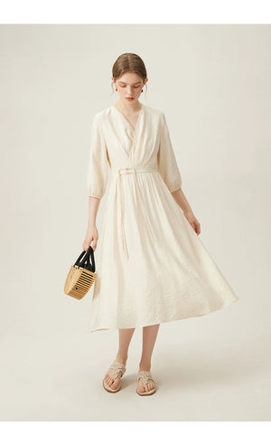 Elegant v-neck jacquard midi dress with puff sleeves