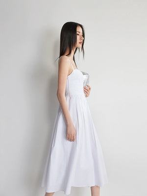 Back view of A-line white dress with slim straps