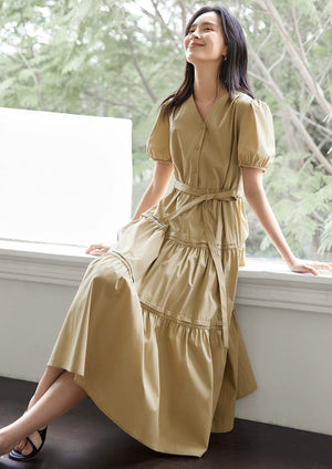 Taileroom V-neck vacation dress in warm neutral tone
