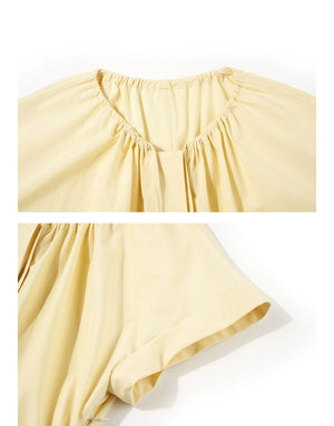 Structured yellow cap sleeve dress for transitional wear