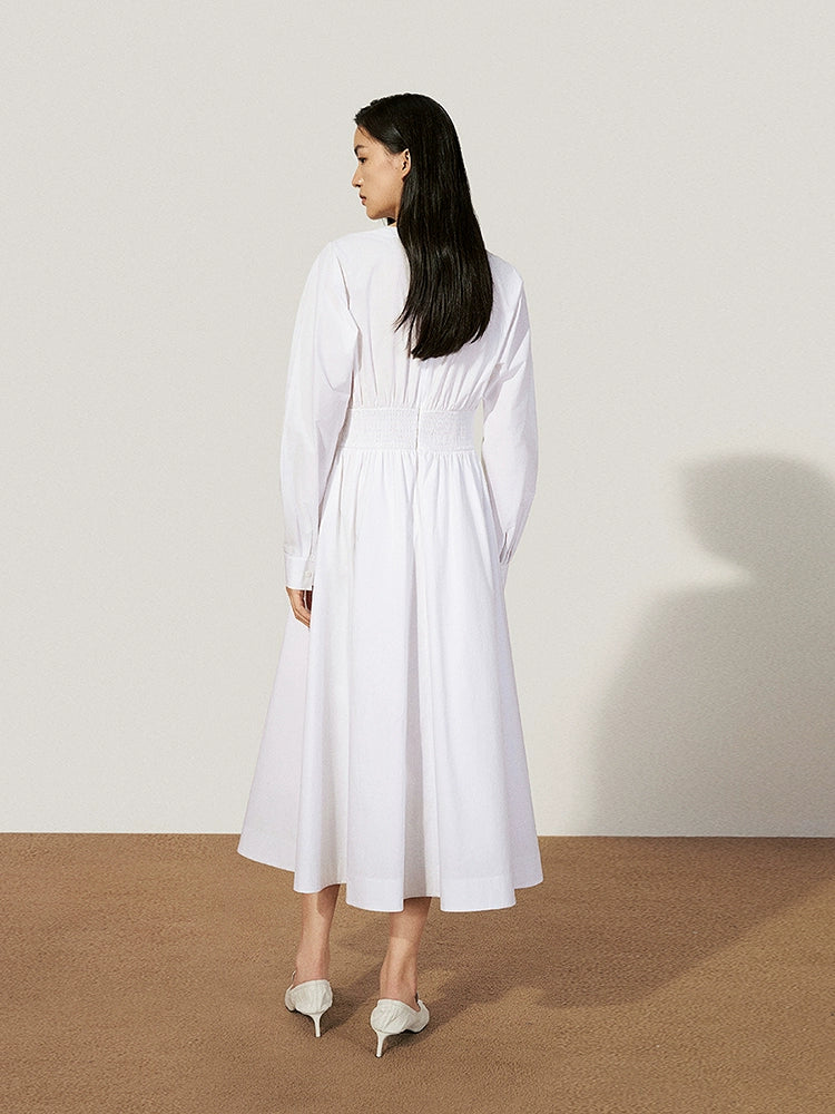 Back view of flared white French-style dress