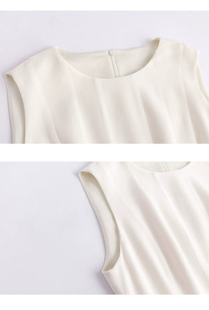 Front view of ivory sleeveless pleated mini dress