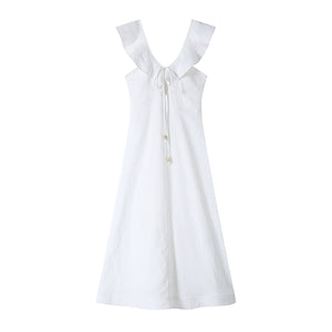 Rear view of ruffled linen dress with open back detail