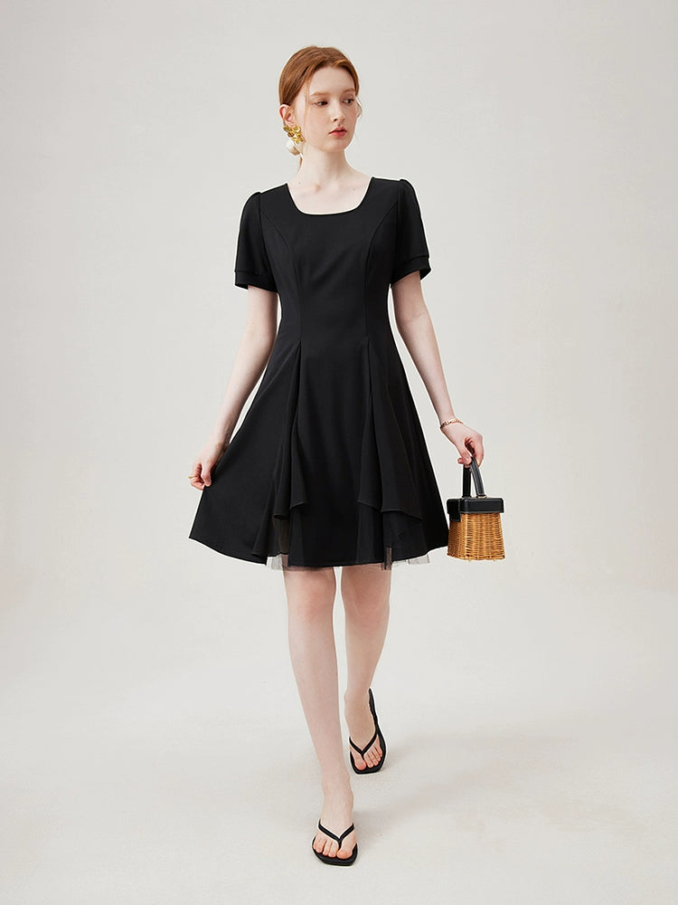 Detail shot of collar and upper bodice on black buttoned linen dress