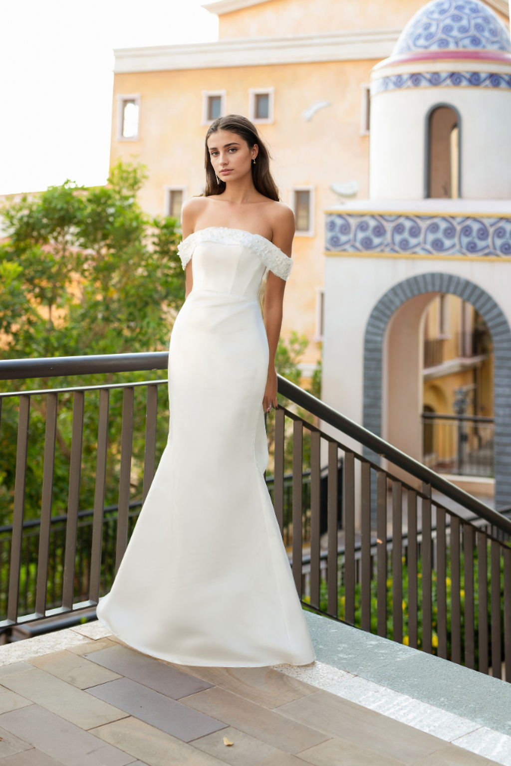 Mermaid gown with strapless bodice and 3D floral accents