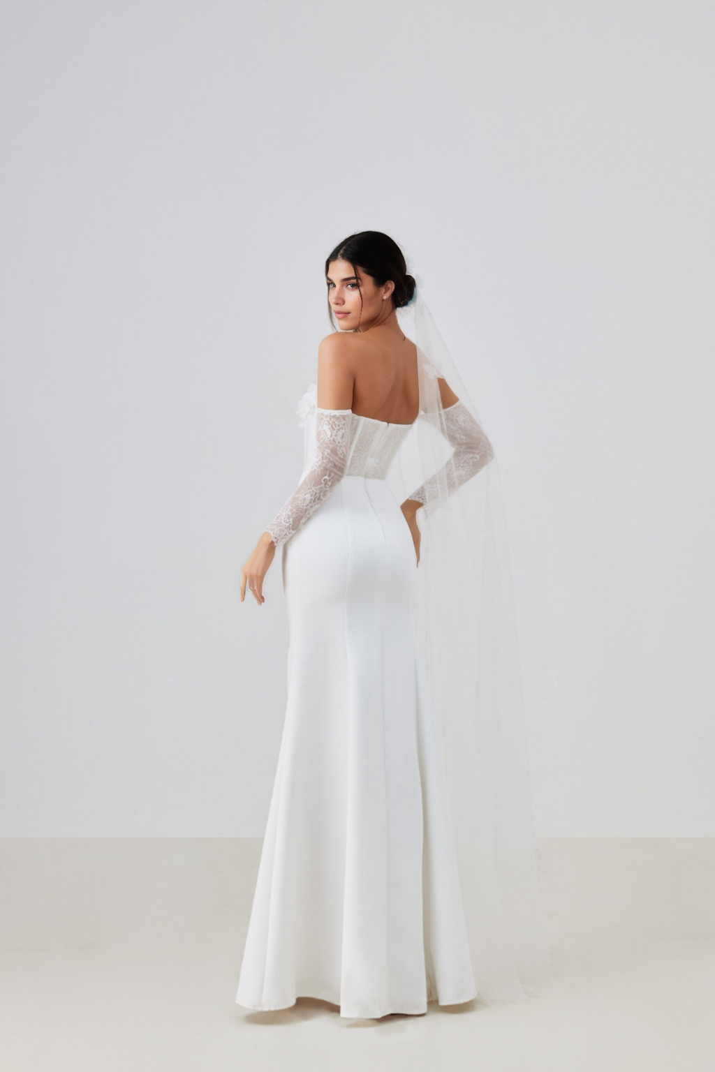 Cupped bodice dress with 3D floral embellishments on the sleeves with Chapel Wedding Veil