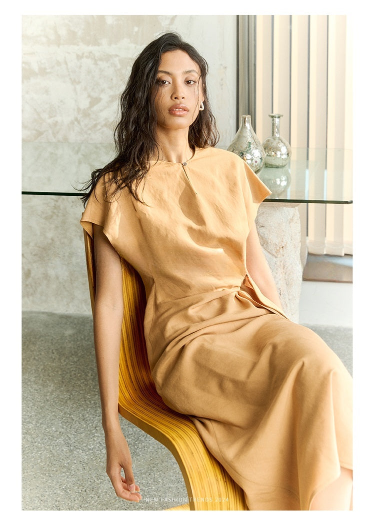 Side profile of linen dress showing waist definition and cap sleeves