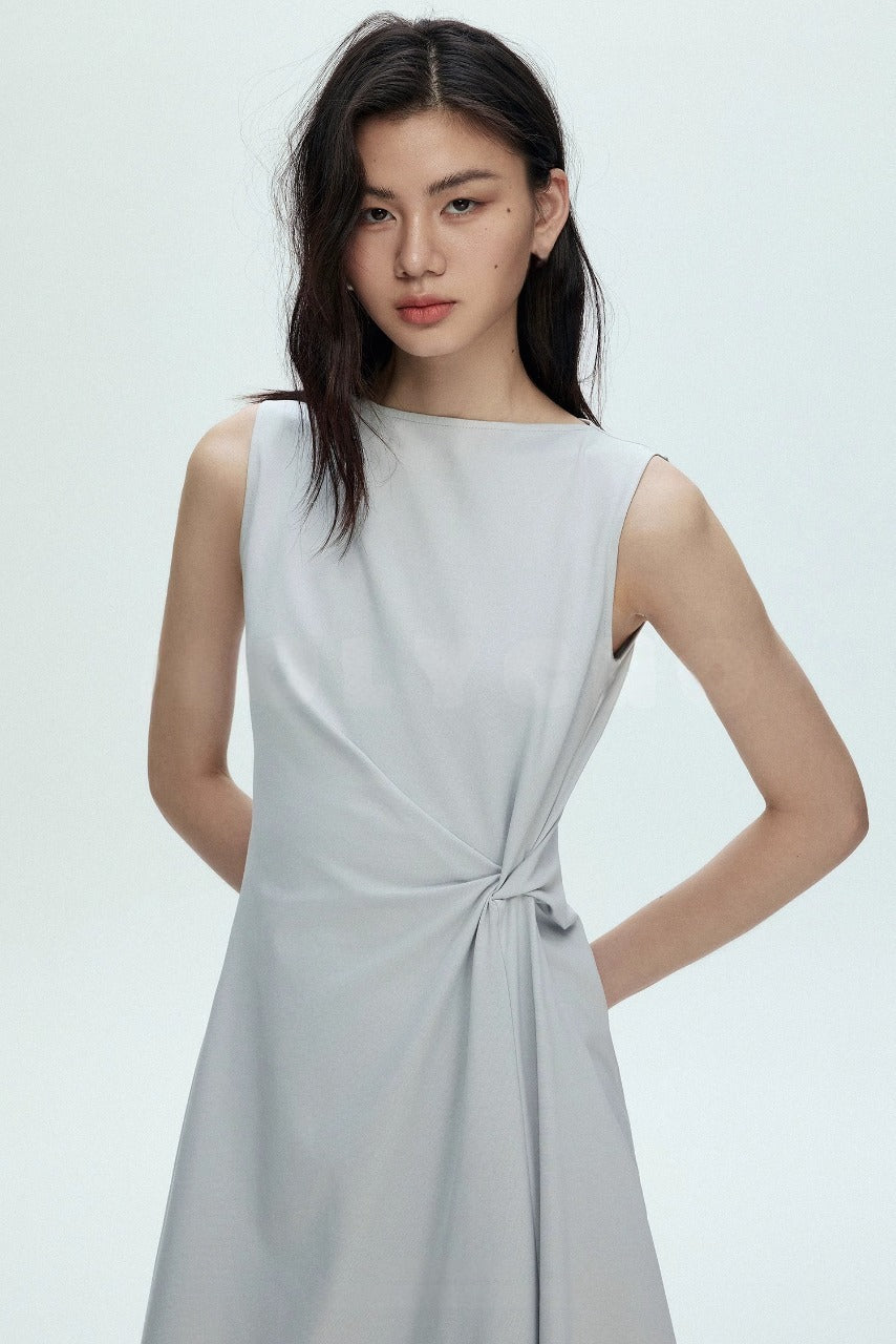 Women's long neutral dress with cinched waist