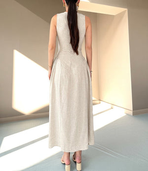 Front view of sleeveless gathered linen dress