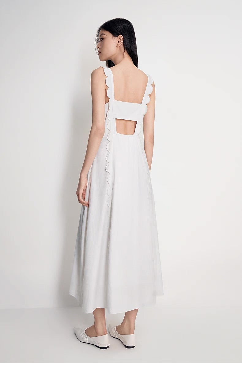 Back view showing scallop-trim and open back with elastic