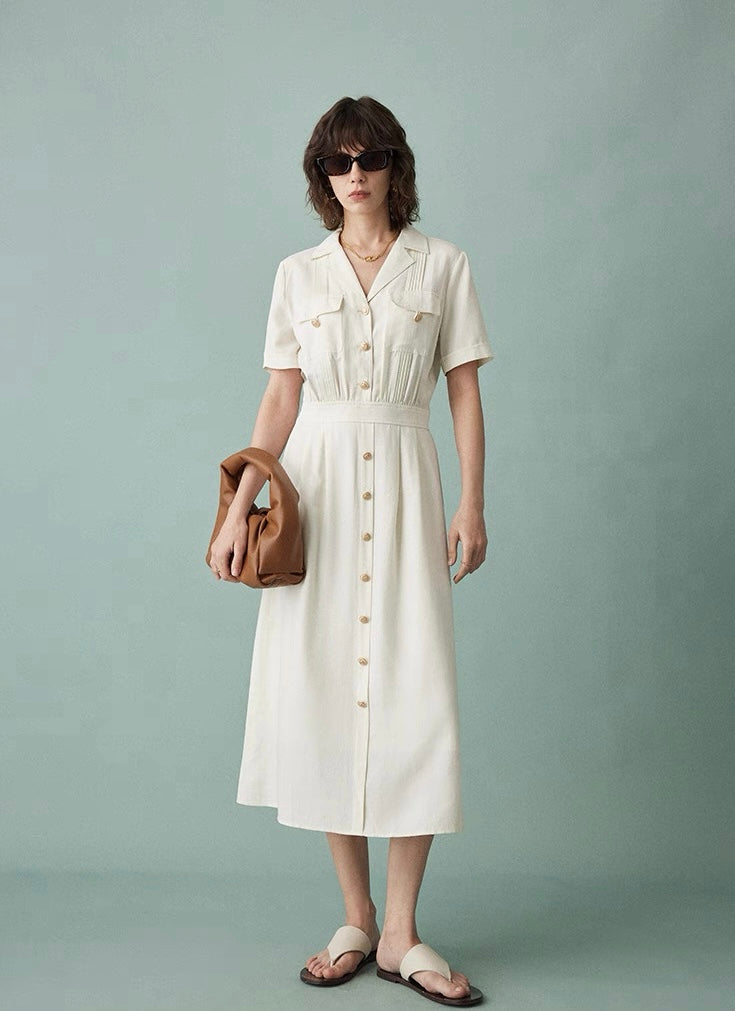 Back view showing gathered waistband and A-line skirt