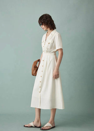 Model styling cream shirt midi dress with oversized bag