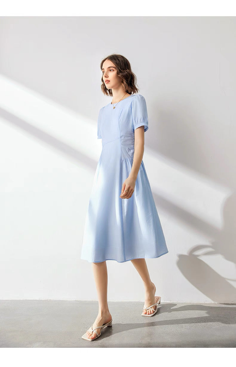 Back view of French-style chic dress with puff sleeves