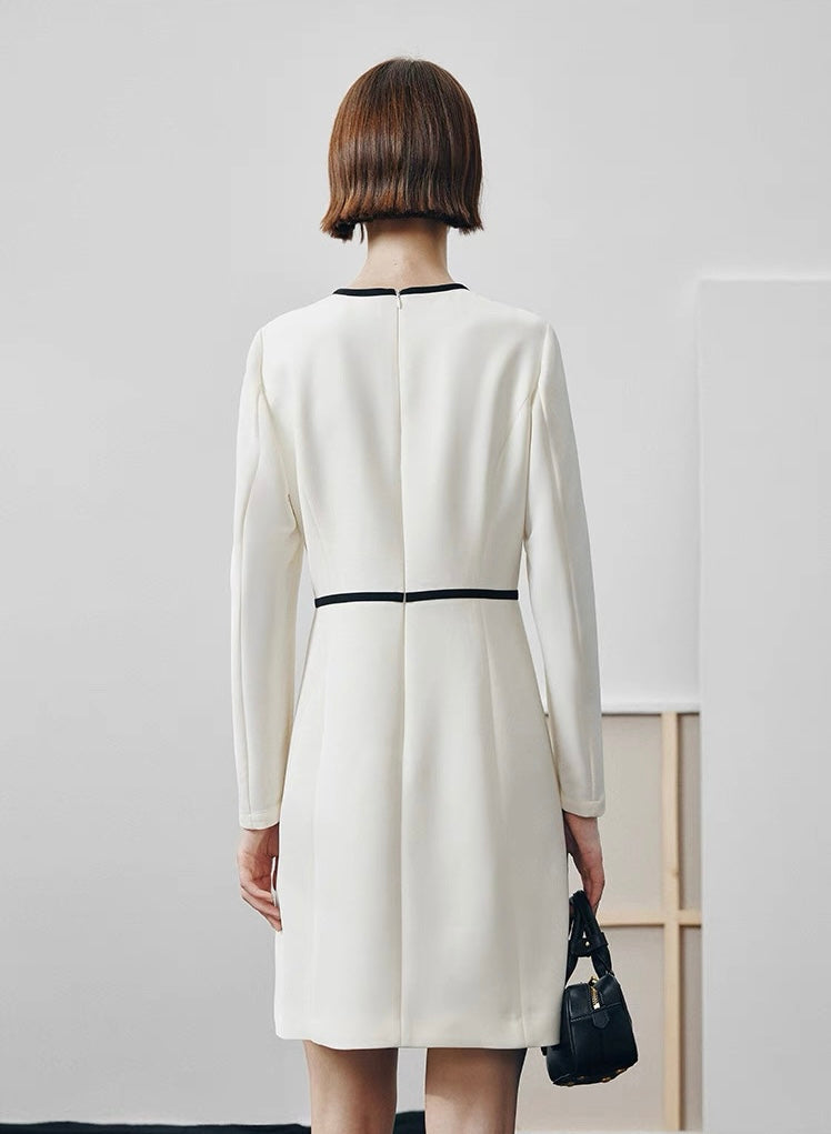 Minimalist black and white dress on female model