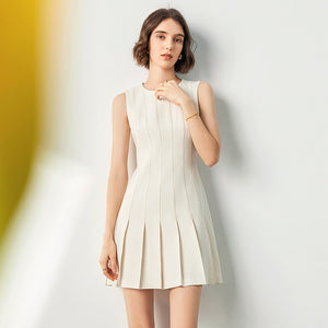 Feminine white pleated mini dress by taileroom