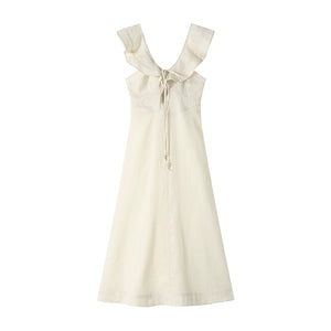 Model holding scarf tote styling flutter sleeve dress