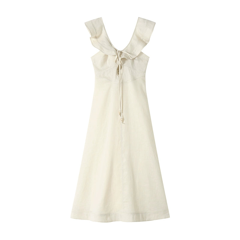 Model holding scarf tote styling flutter sleeve dress