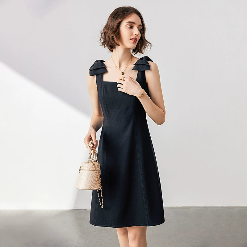 Model wearing the dress styled with-blazer and heels