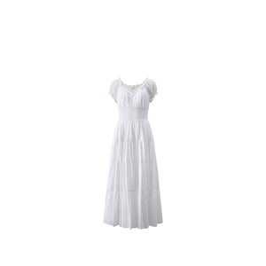 Elegant white dress with tiered skirt and puff sleeves