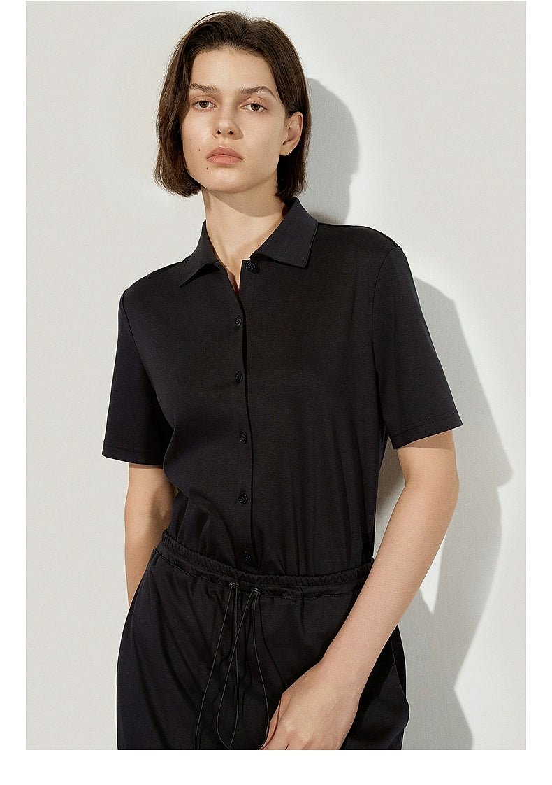 Full-length black dress for minimalist styling
