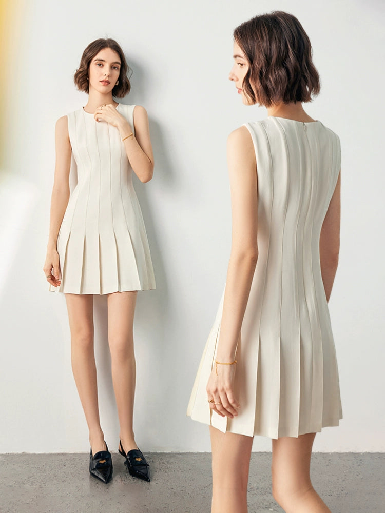 Front view of ivory sleeveless pleated mini dress