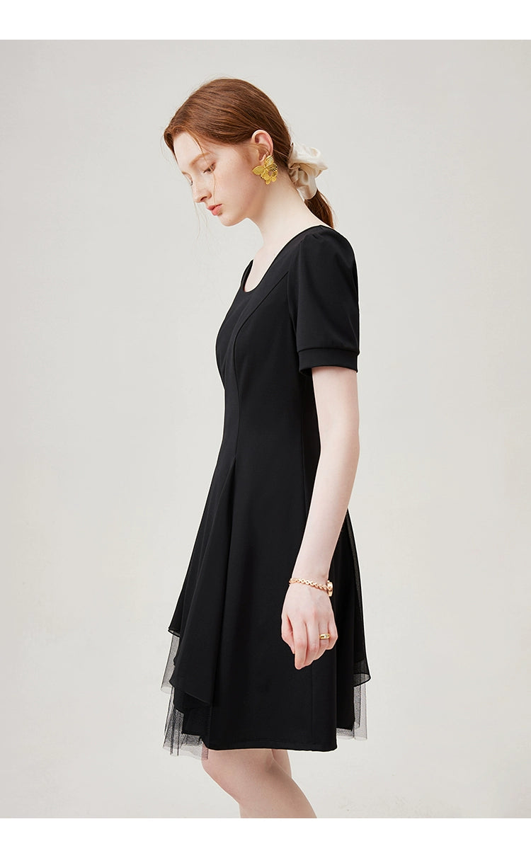  Full front view of black dress with tulle inserts