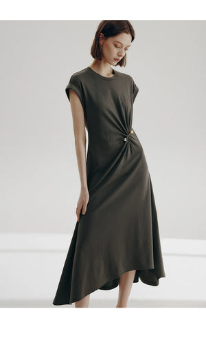 Hand-pleated waist detail with asymmetrical metal pin