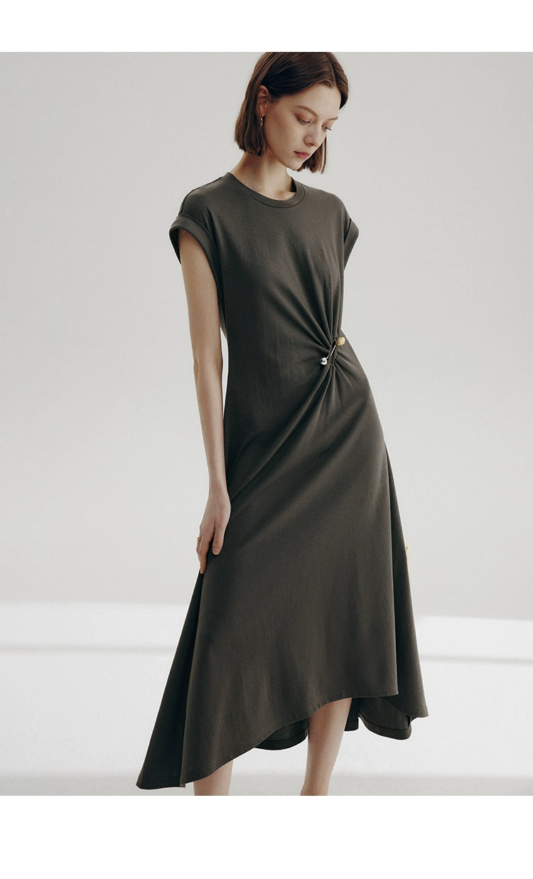 Hand-pleated waist detail with asymmetrical metal pin