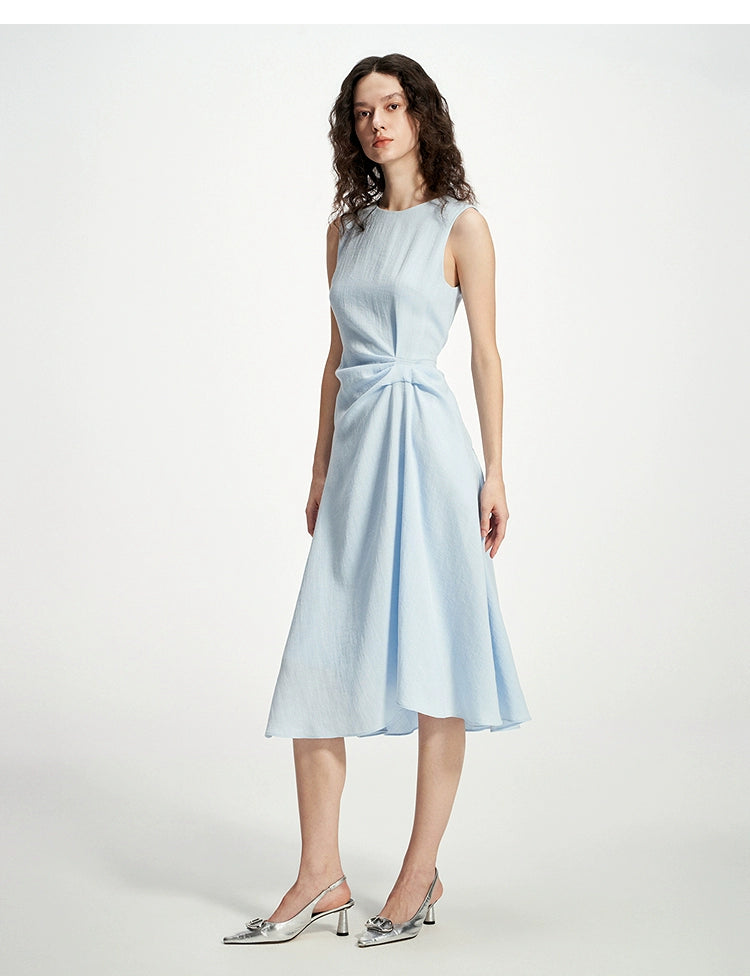 Cinched waist midi dress styled with silver heels