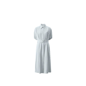 Modern resort-style outfit with subtle structure
