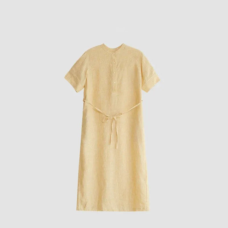 Close-up of shirt collar and button placket detail on linen dress