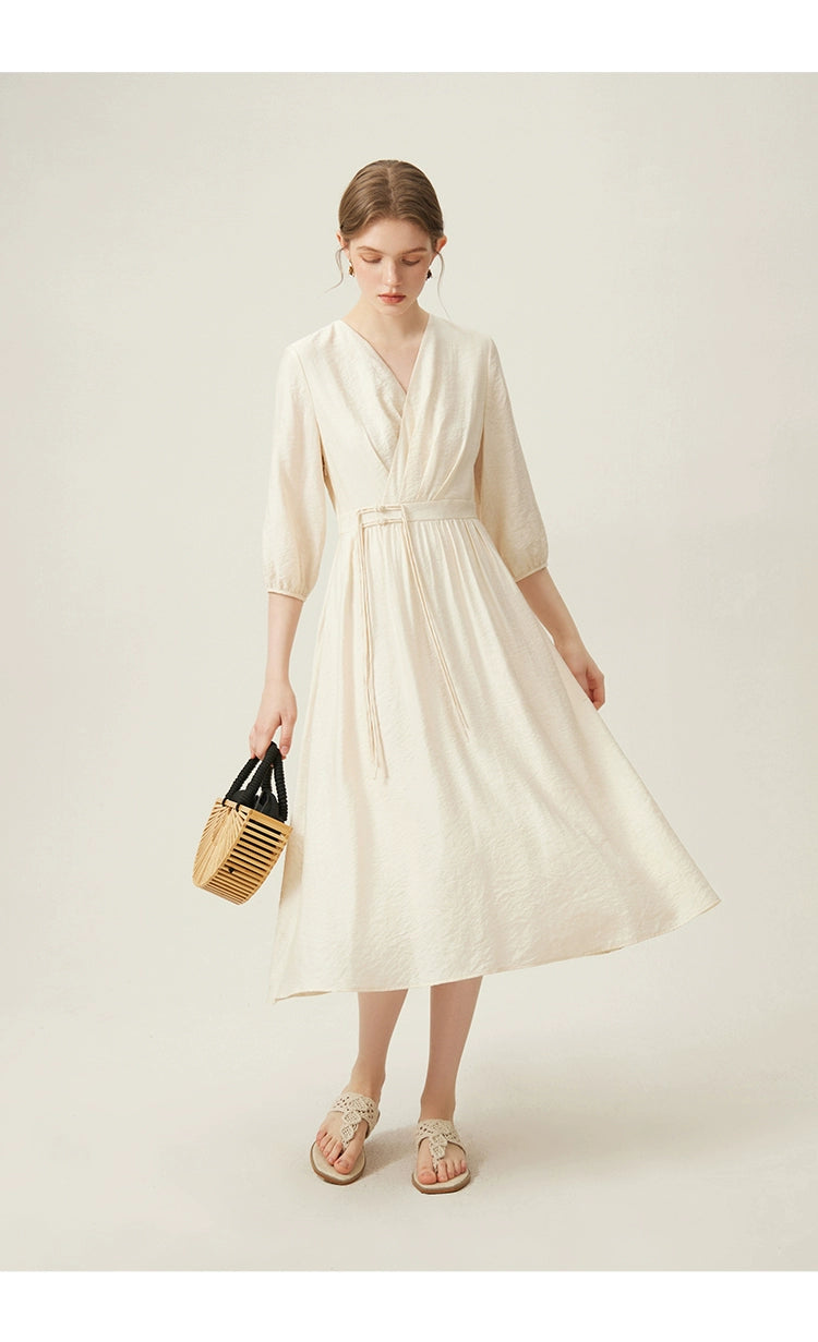 Elegant v-neck jacquard midi dress with puff sleeves