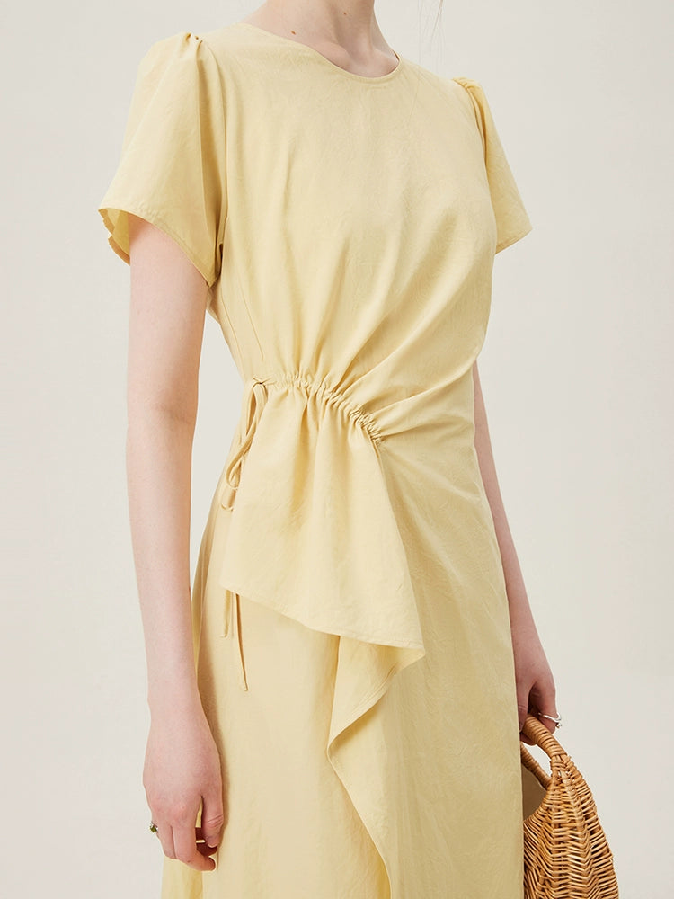  Ruched tie waist detail on white cotton dress