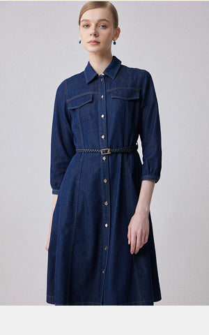 Front view of dark denim belted shirt dress with pockets
