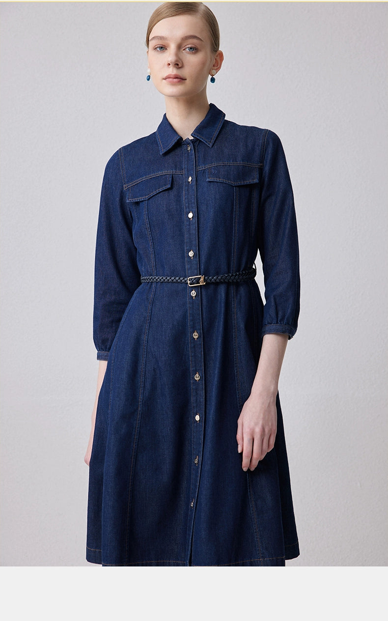 Front view of dark denim belted shirt dress with pockets