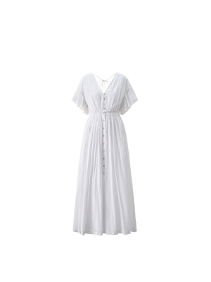  Side seam and soft fabric detail of white cotton dress