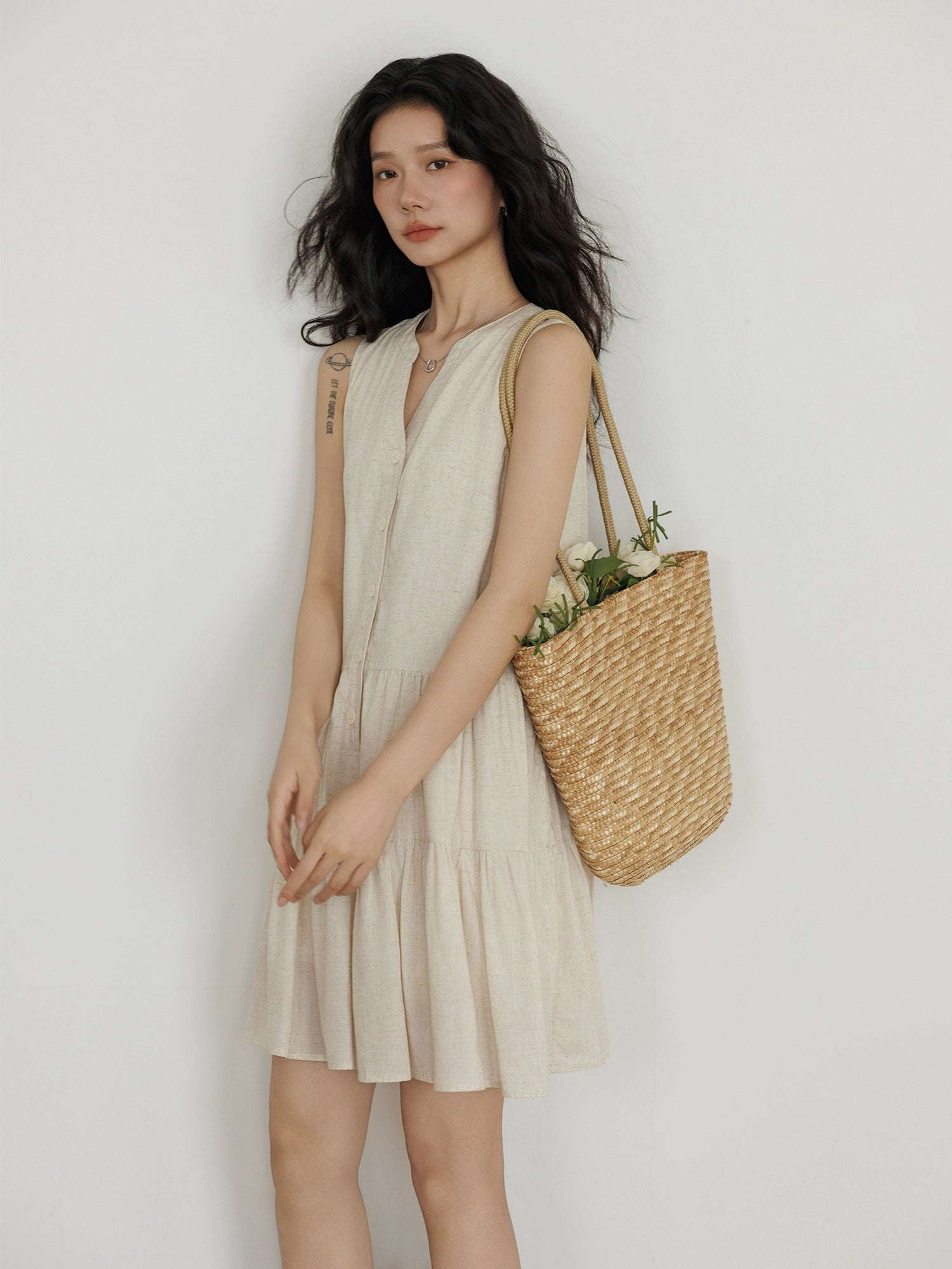 Casual mini dress with V-neck and natural texture
