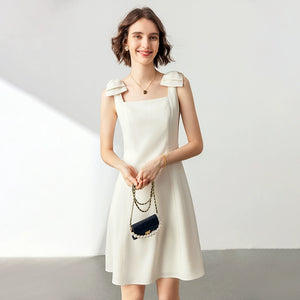 Back view highlighting the dress's clean lines
