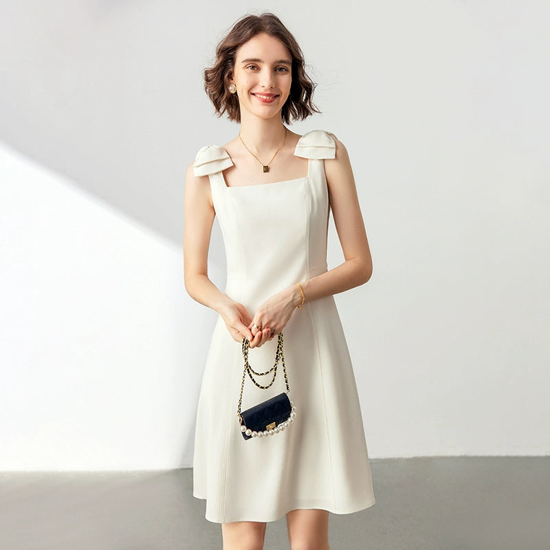 Back view highlighting the dress's clean lines