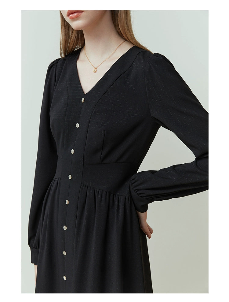 Close-up of linen fabric and hidden zip fastening on neutral-toned dress