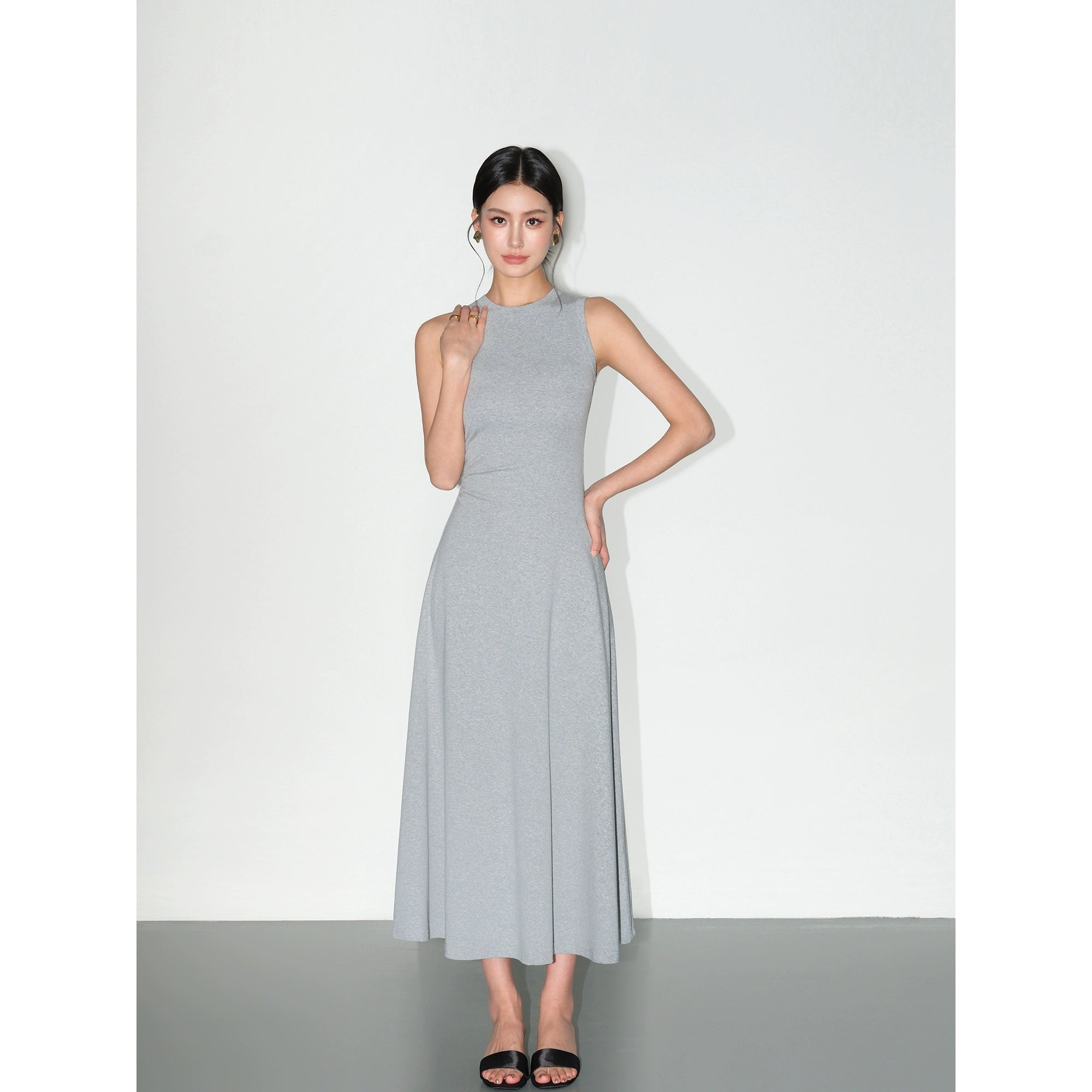 Slim-fit black knit tank dress with cinched waist