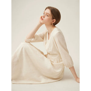Elegant v-neck jacquard midi dress with puff sleeves