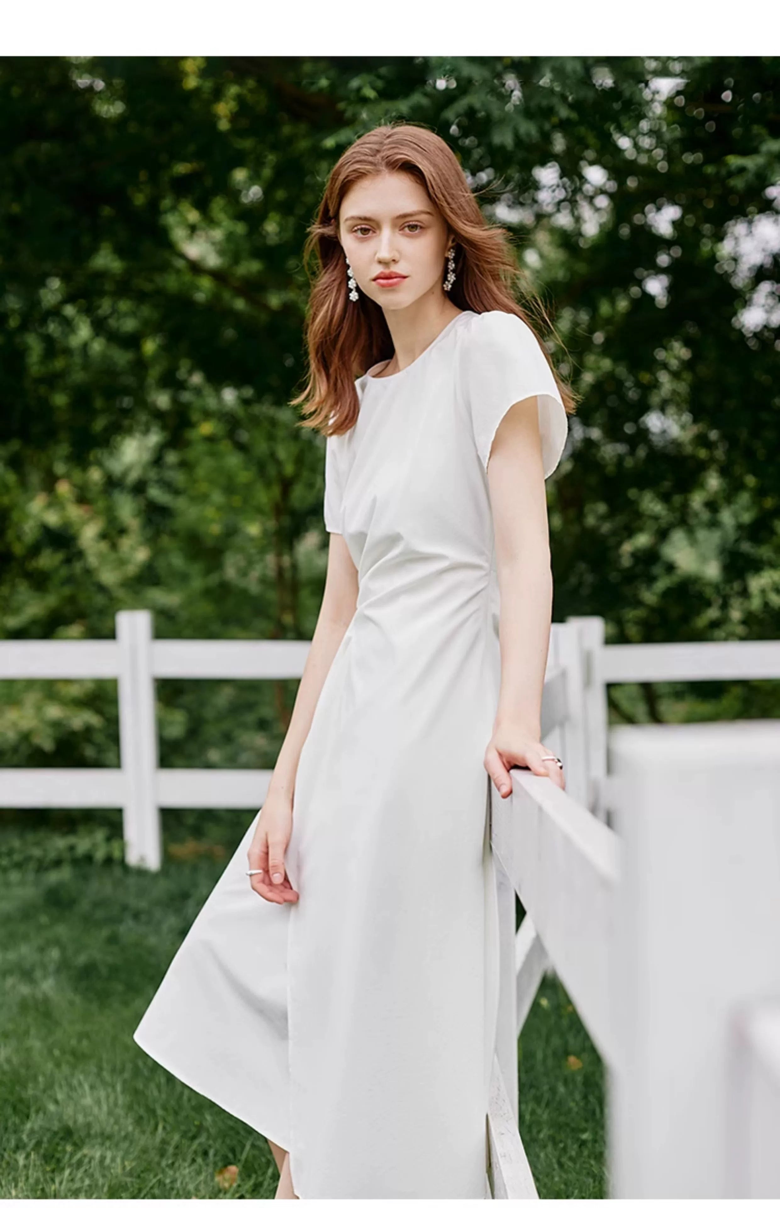 Back neck button detail of white midi dress