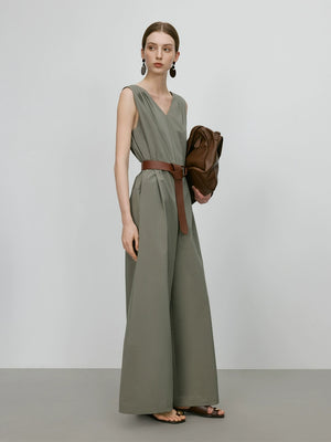 Sleeveless green vest-style jumpsuit with wide-leg fit